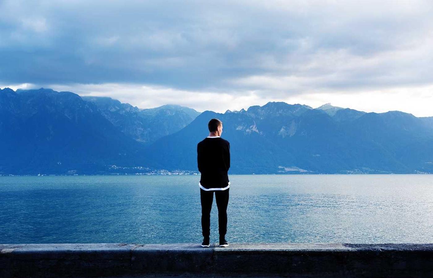 A satellite orbiting Earth, showing solar panels and antennas.